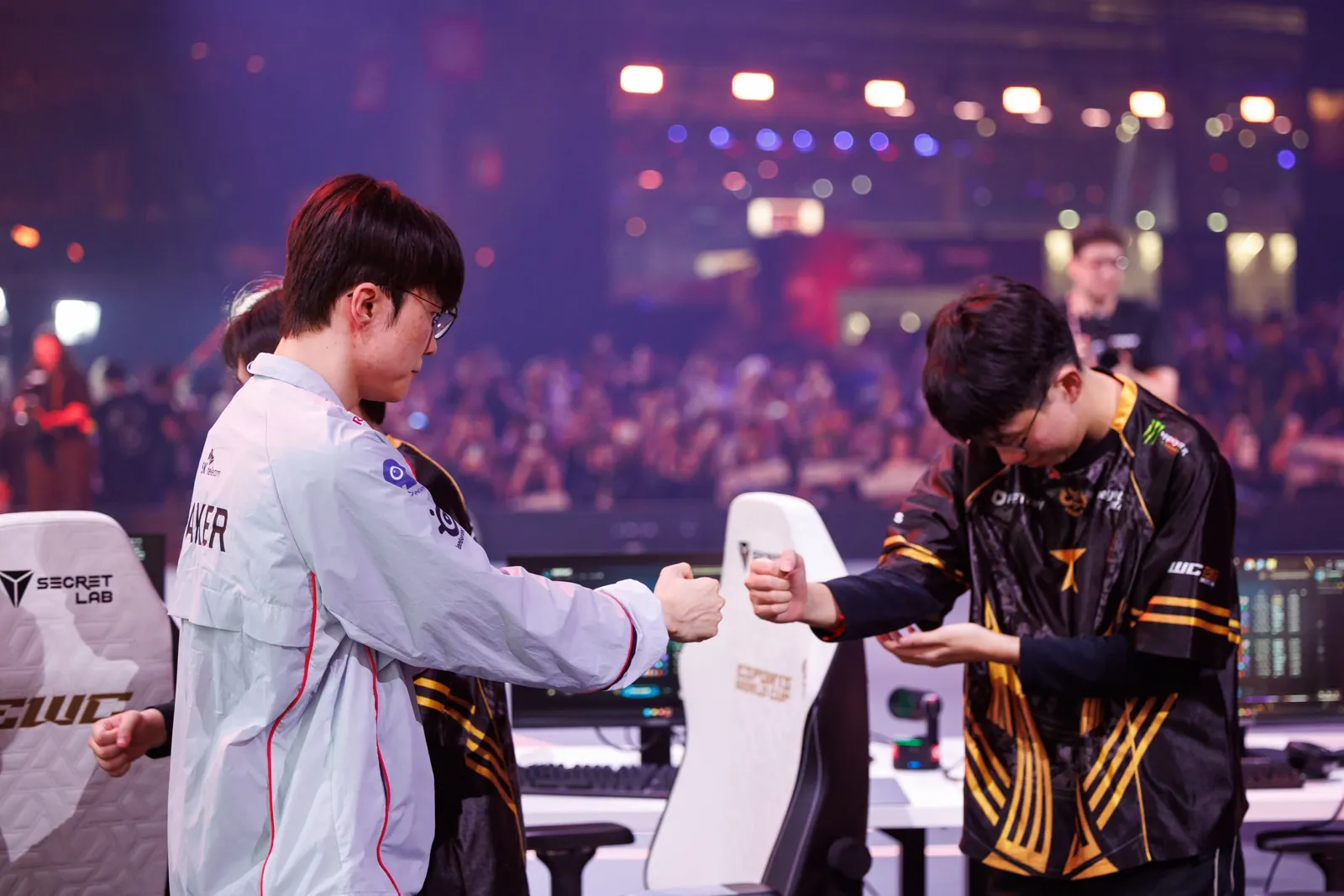 GAM and T1 shake hands after their series at the Esports World Cup