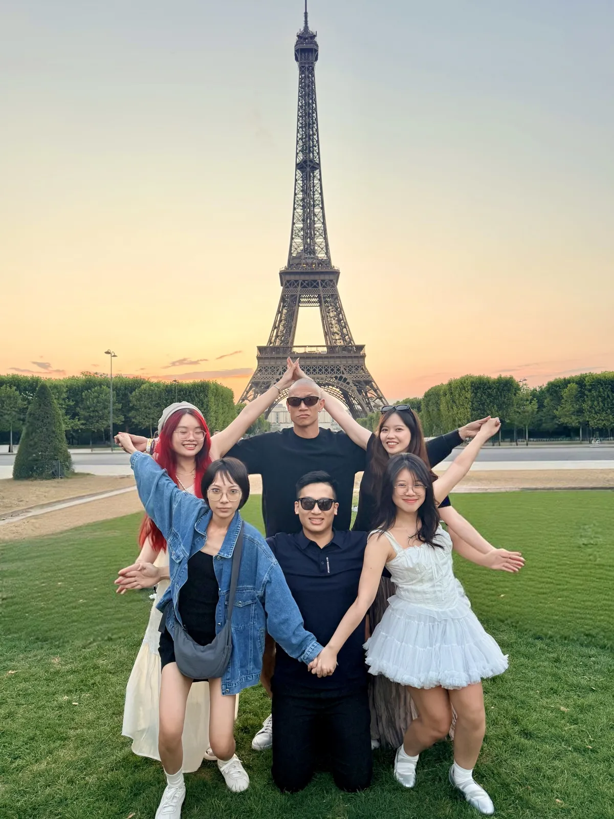 GAM Super Fans and TK at sunset in front of the Eiffel Tower